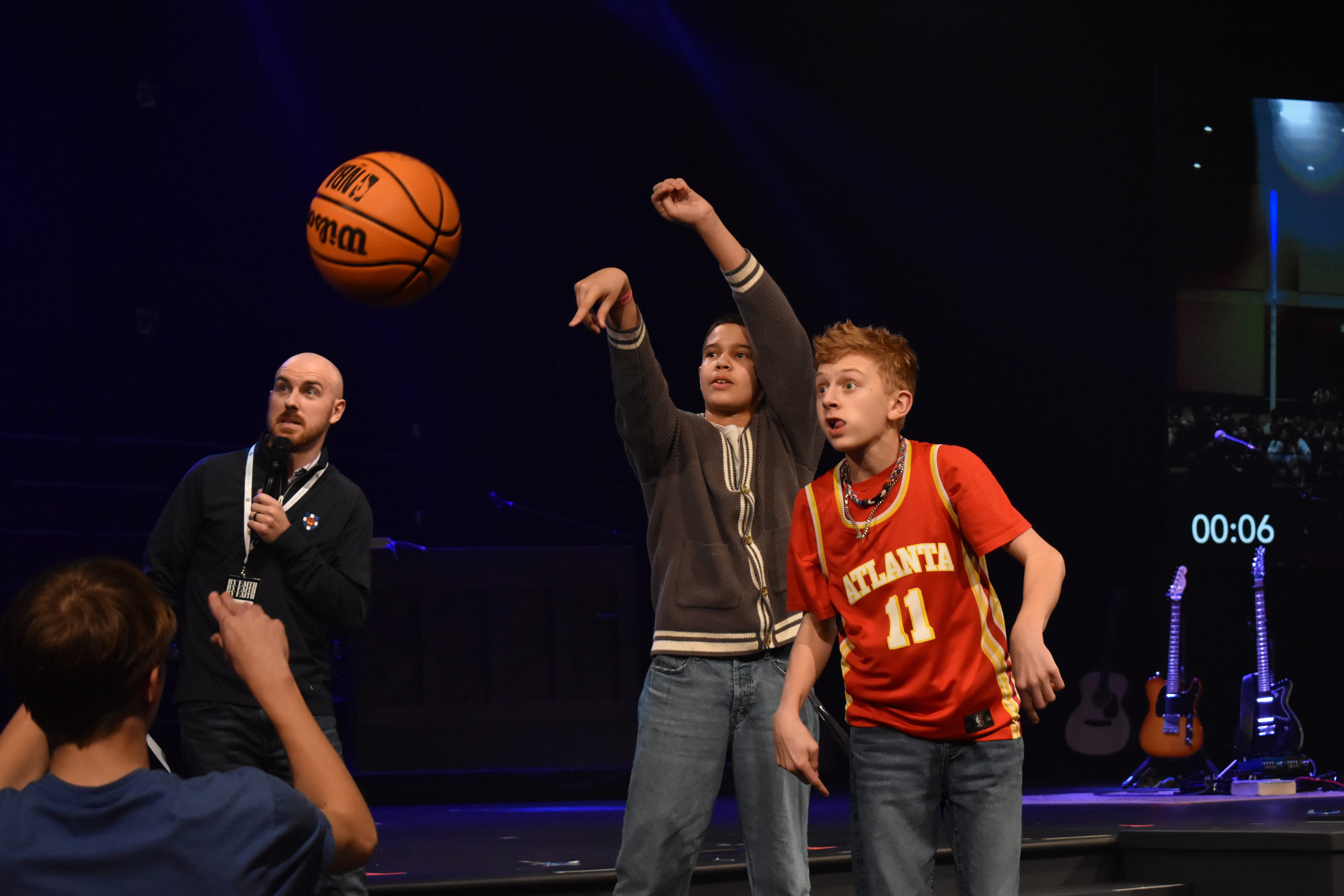 Students playing basketball at LIFT