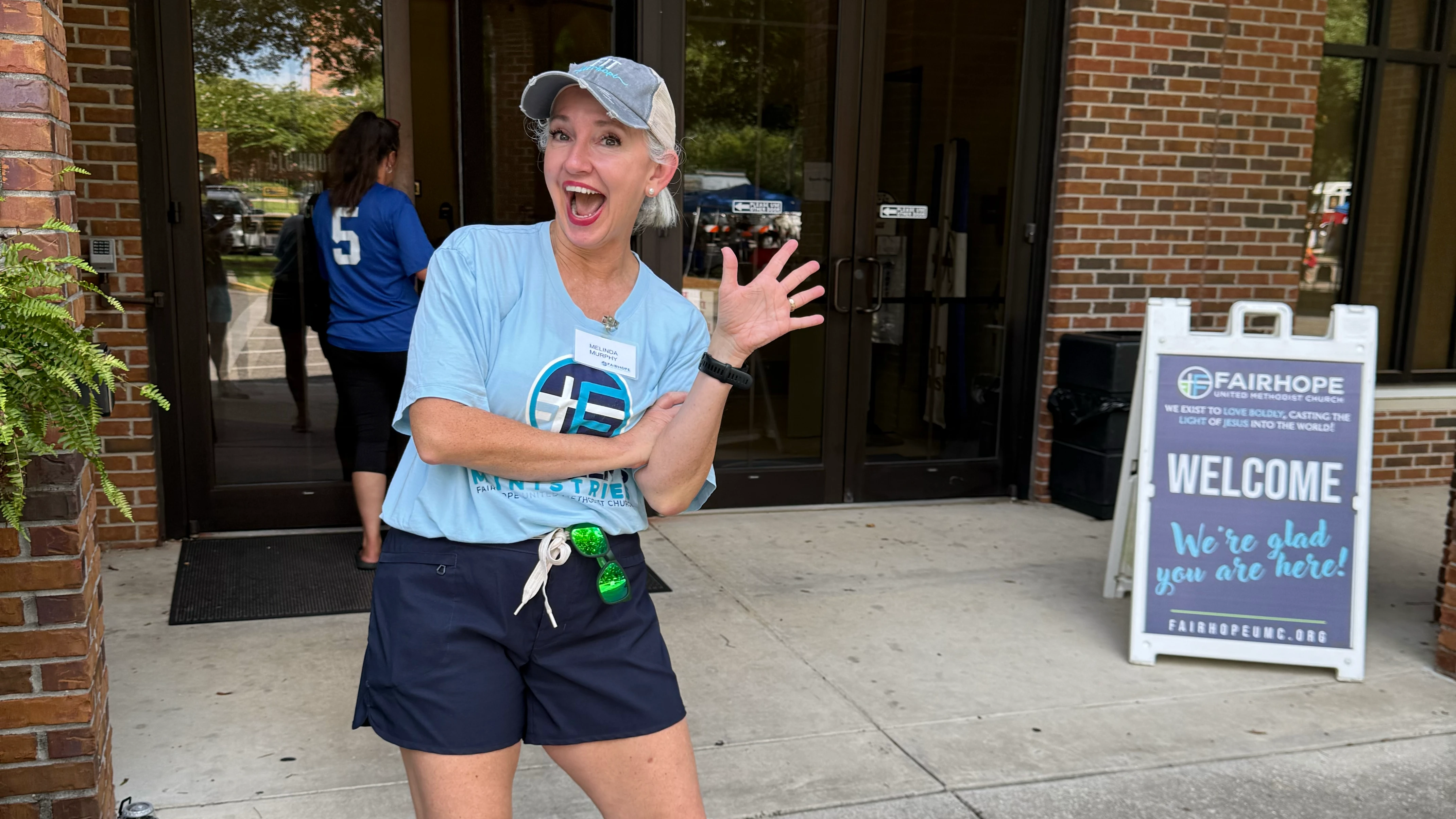 A friendly greeter welcoming visitors at Fairhope UMC
