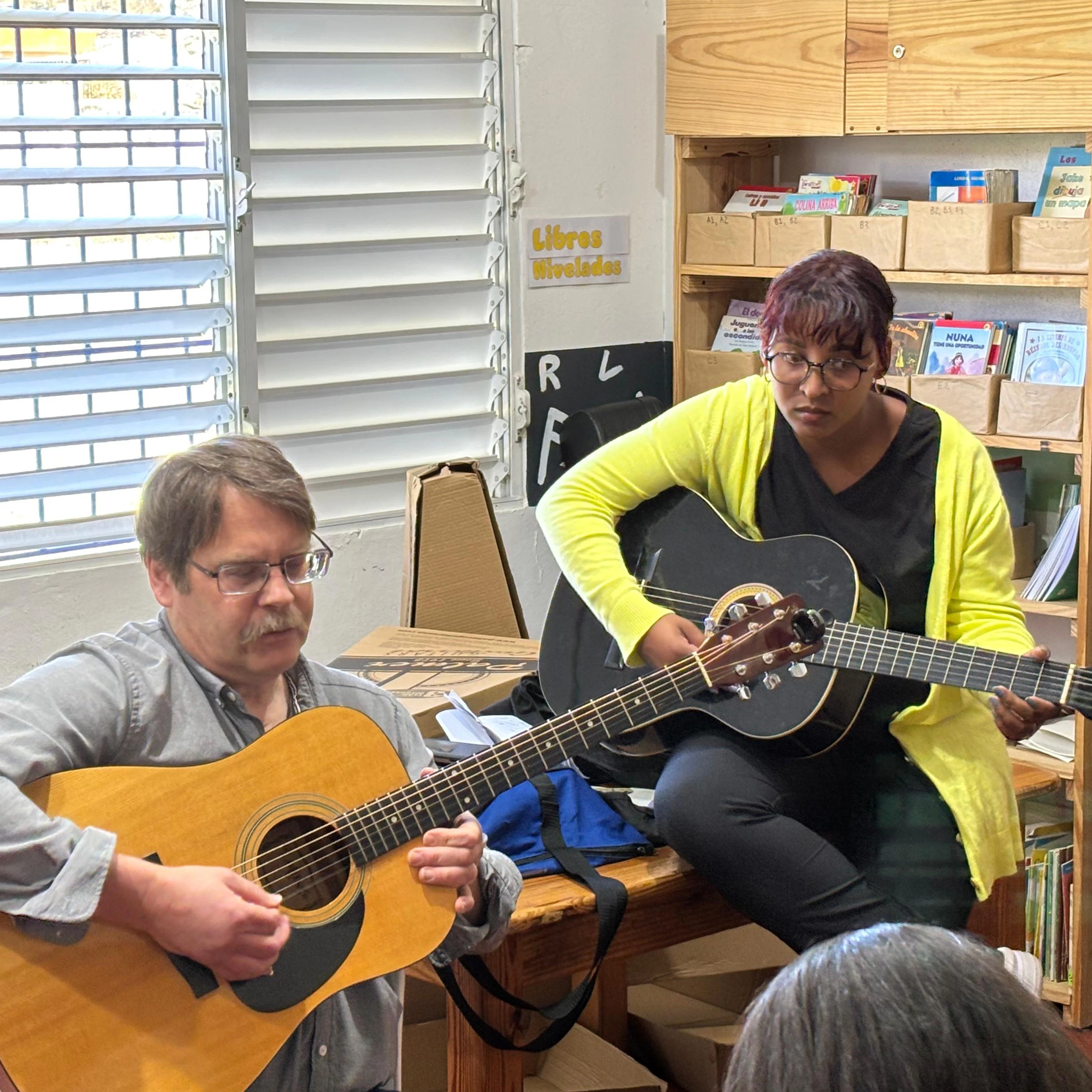 A group serving together on a mission trip through music ministry.