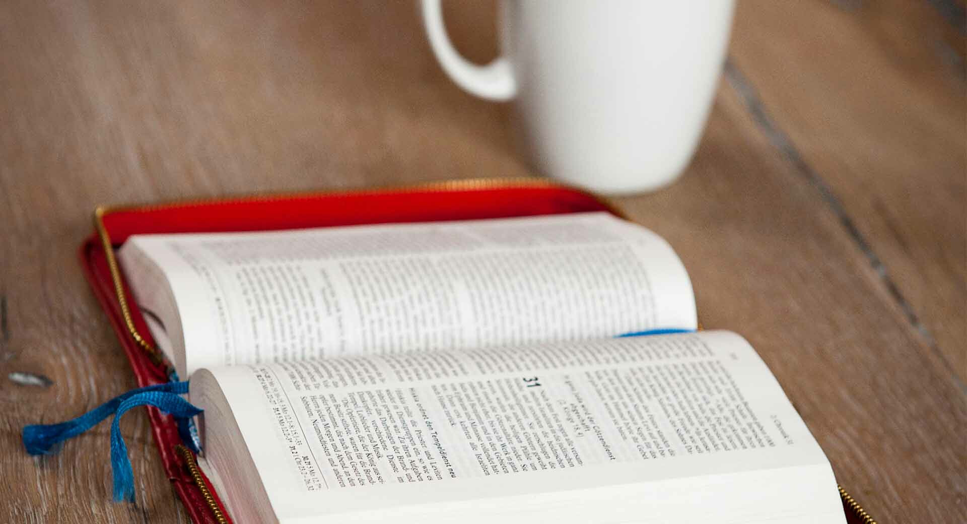 Bible with cup of coffee