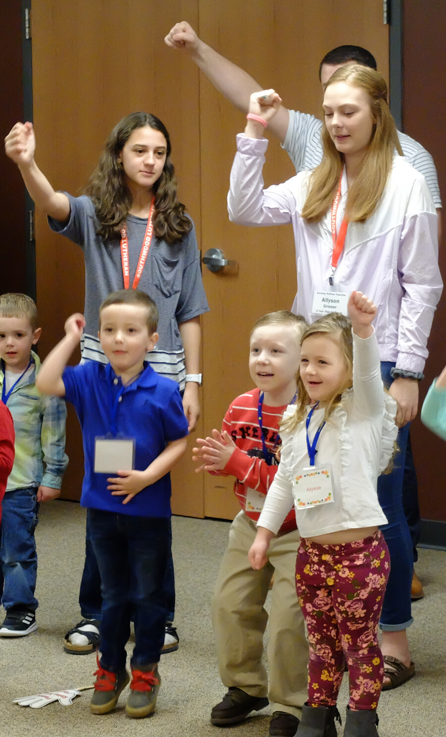 photo: kids singing during large group gathering