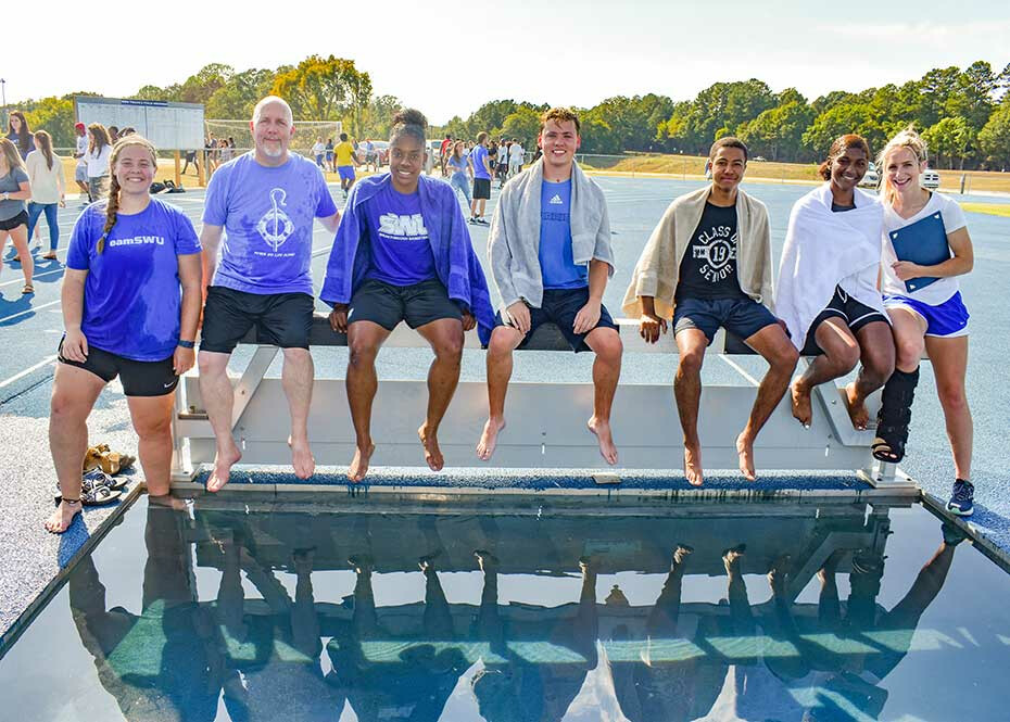 Students baptized at track