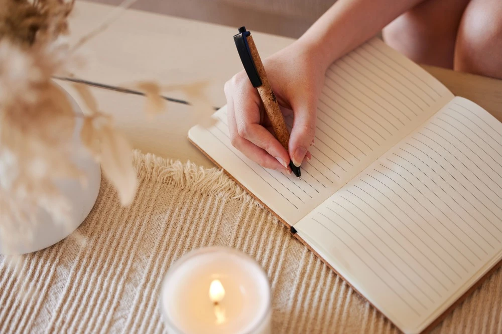 Open Bible and journal on a table