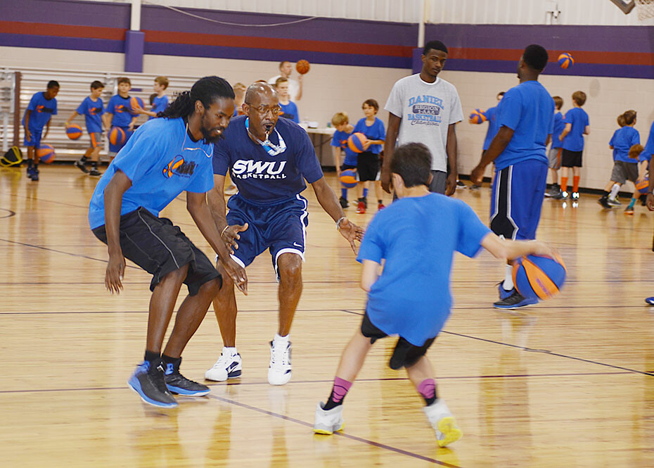 Young players learn basketball fundamentals