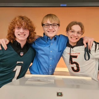Three Youth Smiling