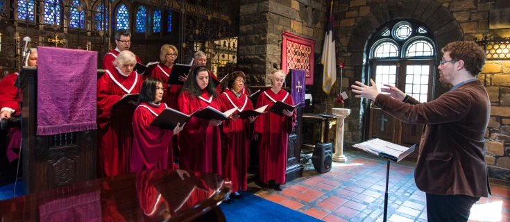 traditional choir being led by Sunny Knable