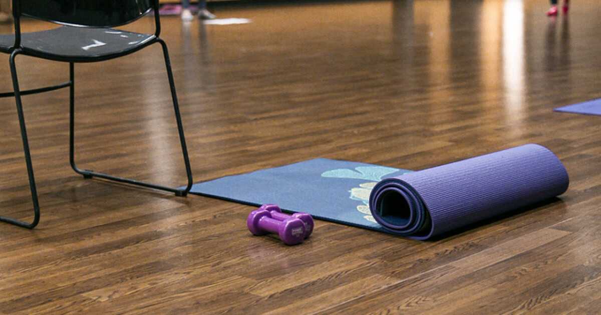 This class combines barre-style exercises to trim the lower body with light hand weights for upper body toning and core training with mat Pilates.