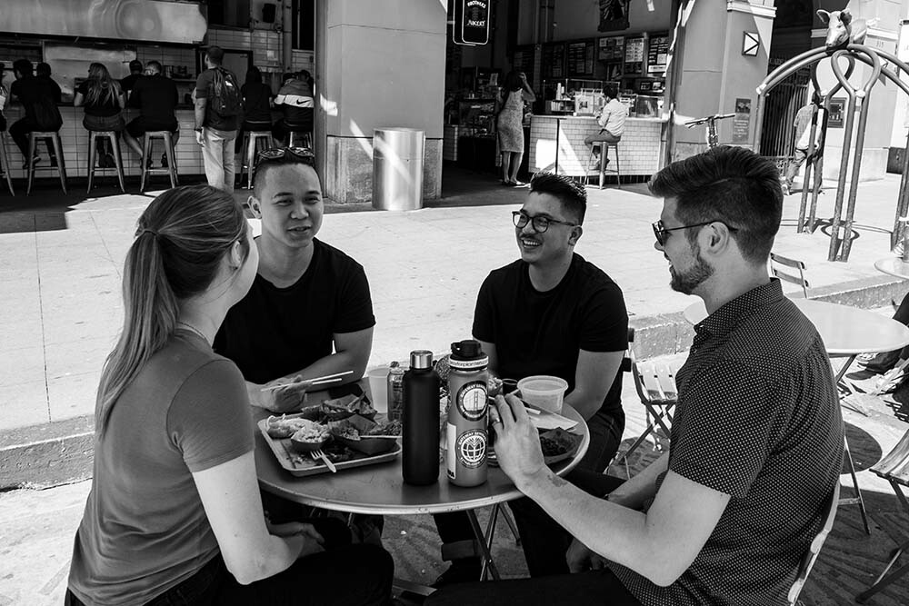 Male student waiting at train stop