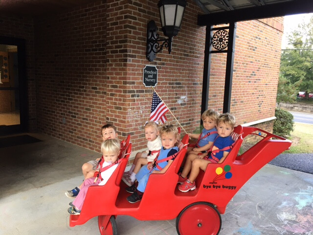 Young child playing in nursery