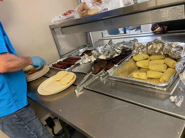 Marshall Scott filling a plate