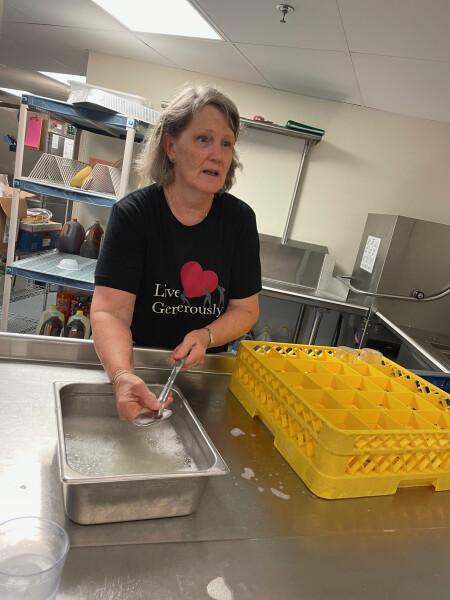 Janet Jew washing dishes