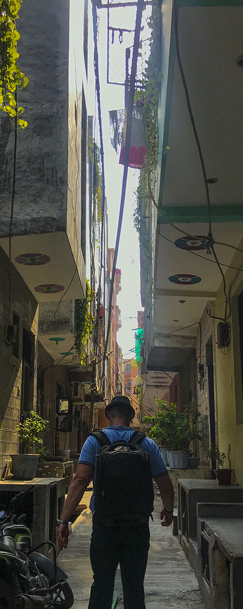 Man walking in alley