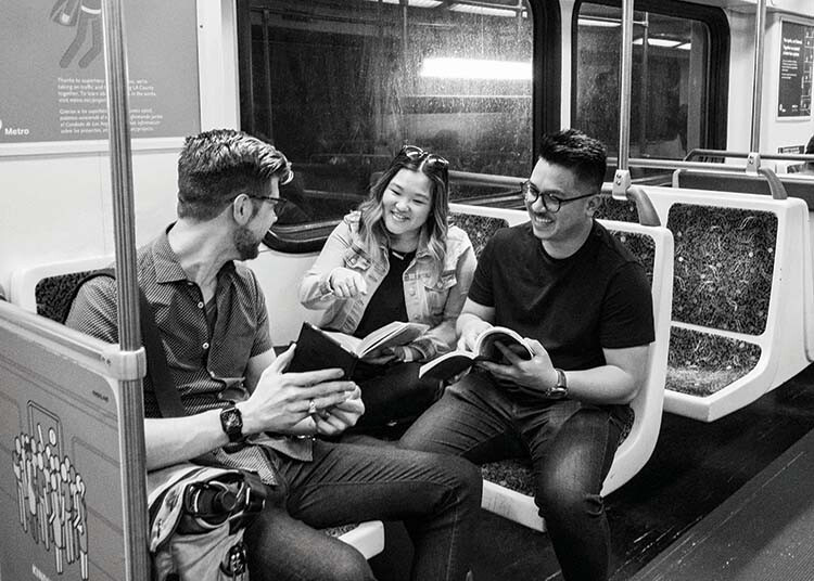 Students talking on a train