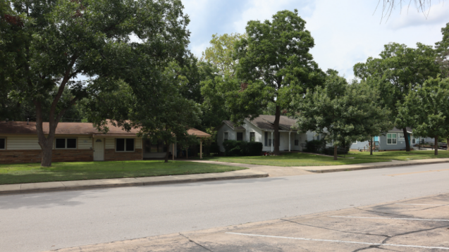 Photo of the houses across the street from the church.