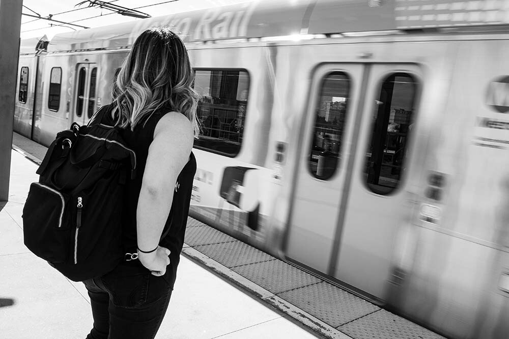 Female students waiting for train