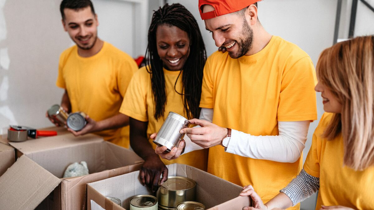 young-adult-group-of-friends-sorting-donations