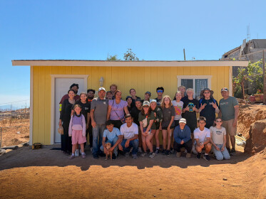 Students in front of completed Homes of Hope house in Ensenada