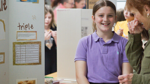 Families and friends visit student math displays