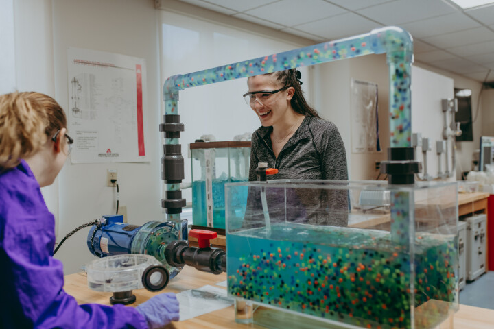 Two women learning about environmental technology