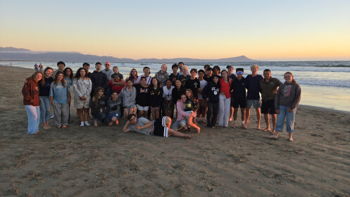 Students on the beach at sunset during YWAM Ensenada trip