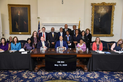 Emory Grove with Gov. Wes Moore, Lt. Gov. Aruma Miller, Del. Charlotte Crutchfield and Greg Wims at the signing of the bill that madates a study on the displacememt that was caused by Urban Renewal at Emory Grove