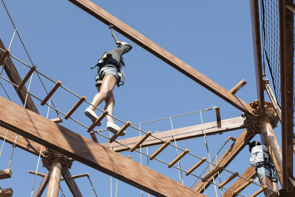 woman-on-high-ropes-course