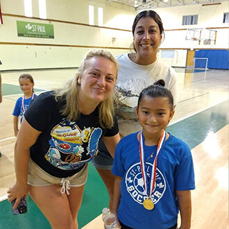 soccer player with family