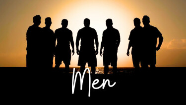 Men silhouetted at sunset