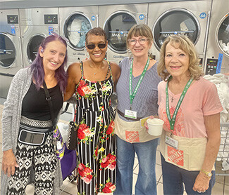 women at the laundromat