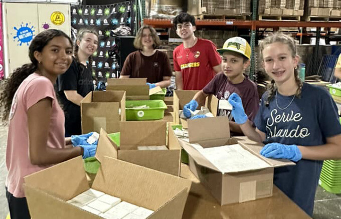 students packing soap