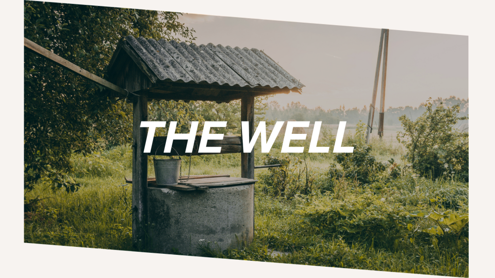A WELL IN A GREEN FIELD