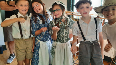 Students immersed in 19th century school life