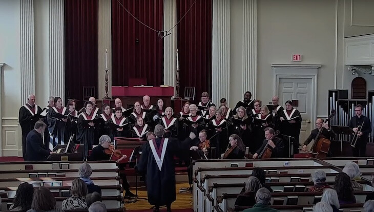 Adult choir with instrumentalists singing Bach cantata