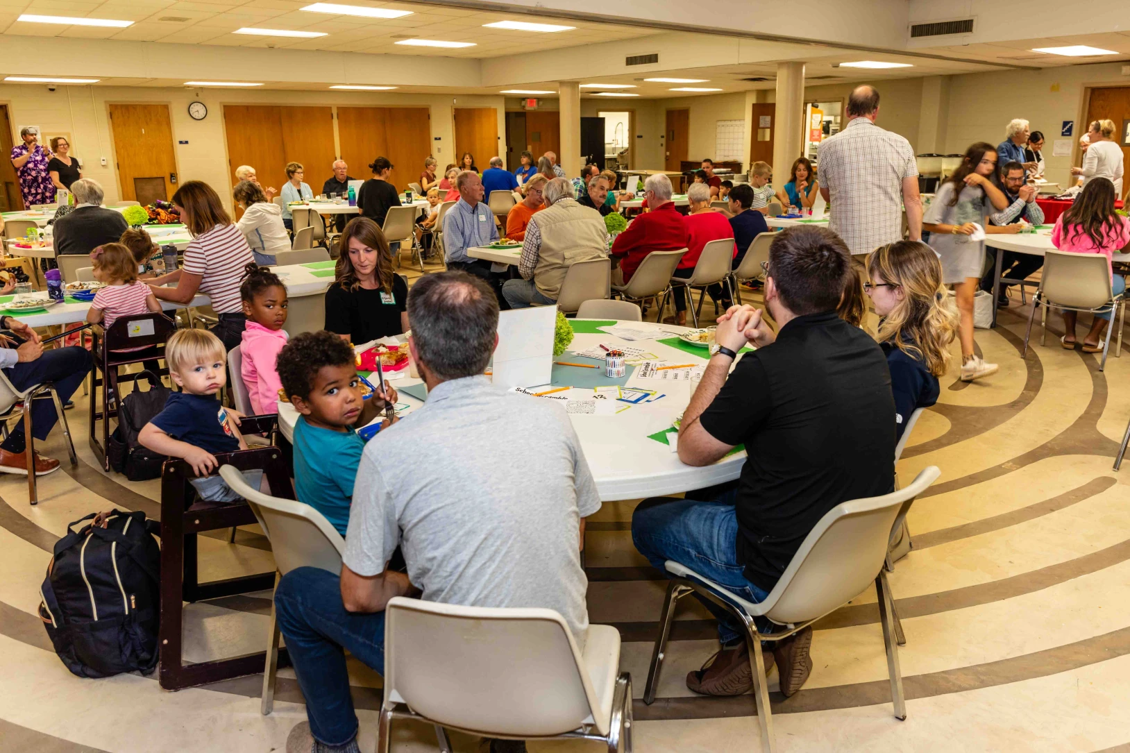 People of all ages sharing a meal on Wednesday evening