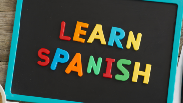 learn Spanish spelled with magnetic letters