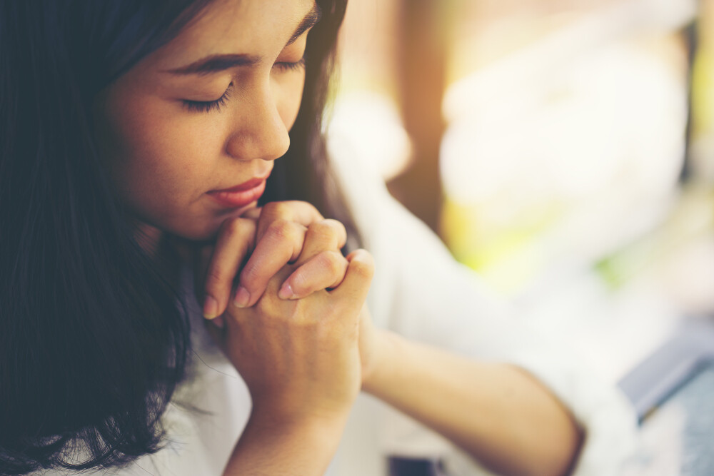 woman-hands-praying-to-god-in-worship