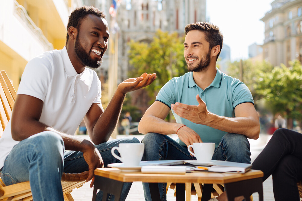 two-men-buddies-connecting-over-coffee