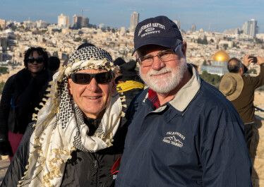 BFCal president Dr. Jonathan Jarboe (left) and Pastor Dale Garland (right) stand in front of the Old City of Jerusalem.