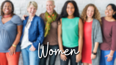 Women. Group of women smiling.