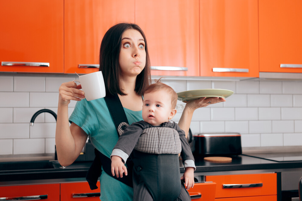 young-mom-with-baby-trying-to-multi-task