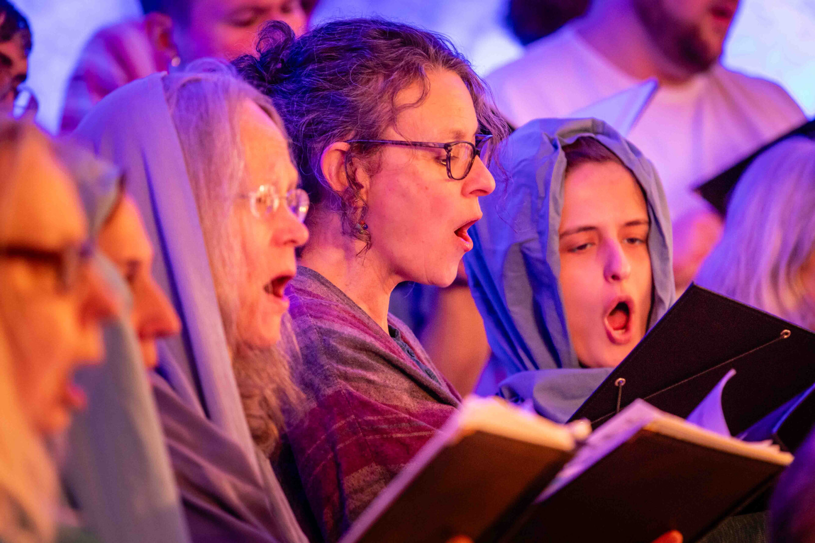 Women of the Chancel Choir in costume in a Christmas program..