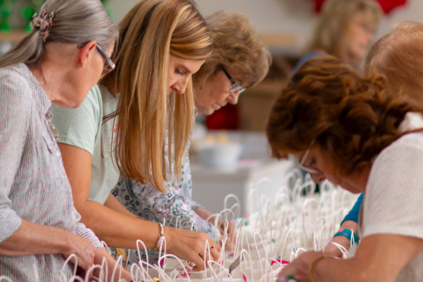 Caring Hearts ministry members assembling care bags