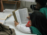 child reading bible - awana