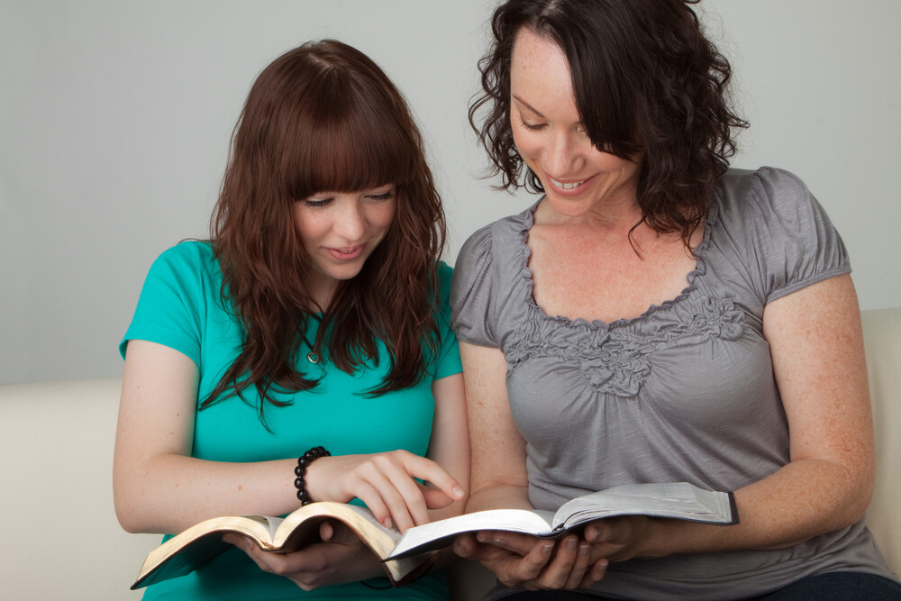 mother-studying-the-Bible-with-teenage-daughter