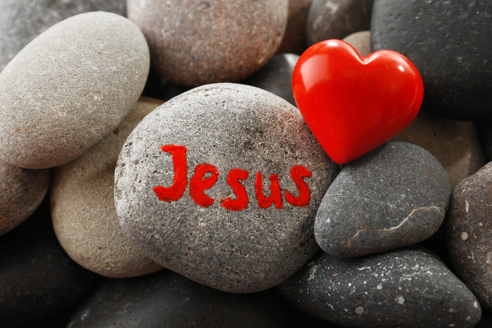 Jesus-and-heart-painted-rocks-in-a-pile-of-rocks