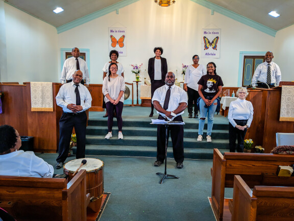 Members of the Christ Deaf UMC choir perform during worship at the church.