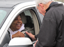 Clergy in Spring Brave Rain, Cold to Deliver Drive-Thru Ashes