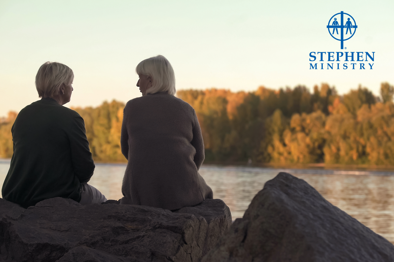 two women talking outside