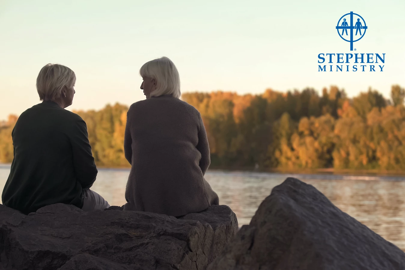 two women talking outside