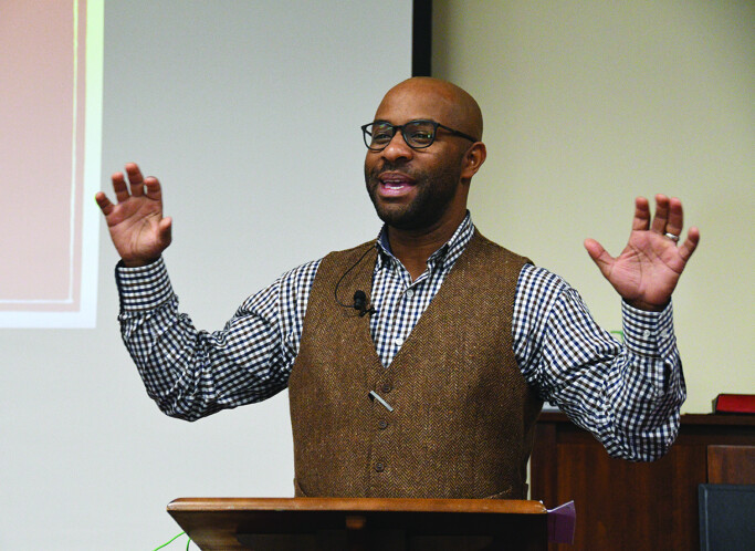 The Rev. Olu Brown speaks at the BWC Mission Center Oct. 27. Photo by Melissa Lauber.